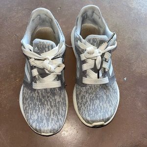Gray and tan adidas running shoes